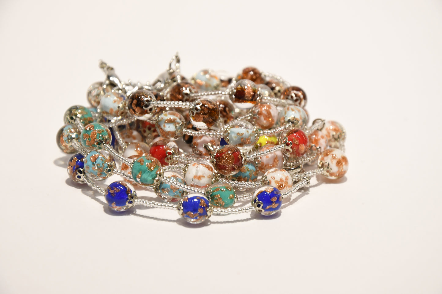 Bracciali argentato con 7 perle stile melograno e perline in vetro di Murano