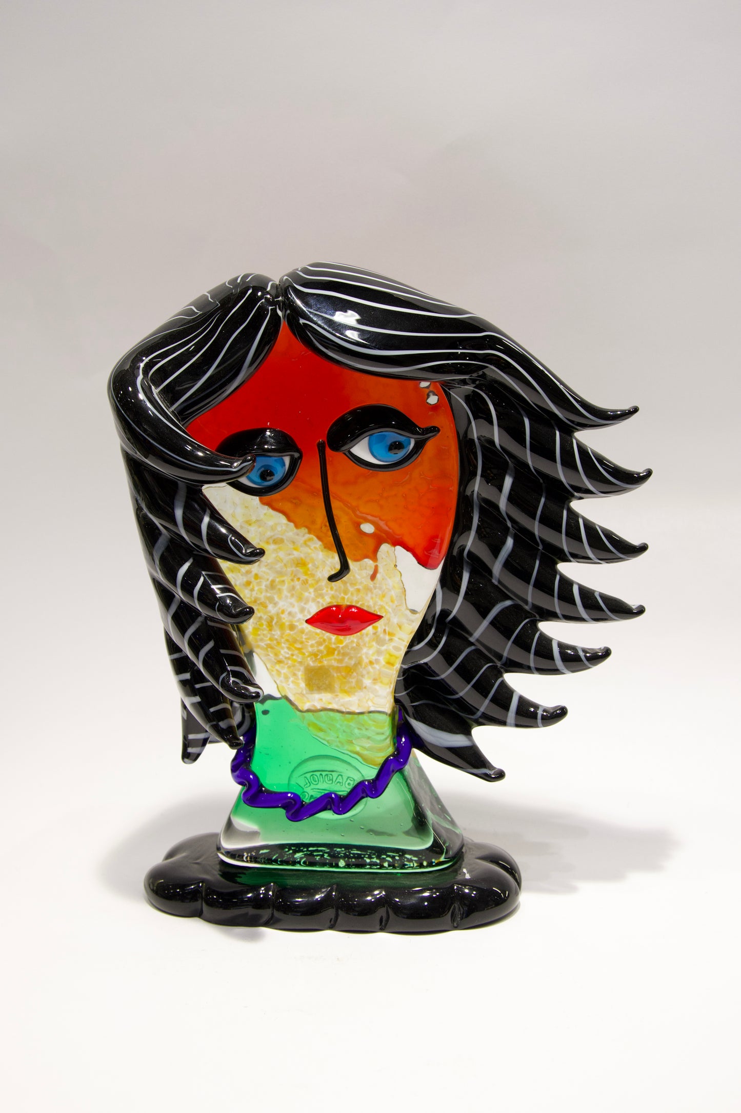 Large Picasso style heads in Murano glass