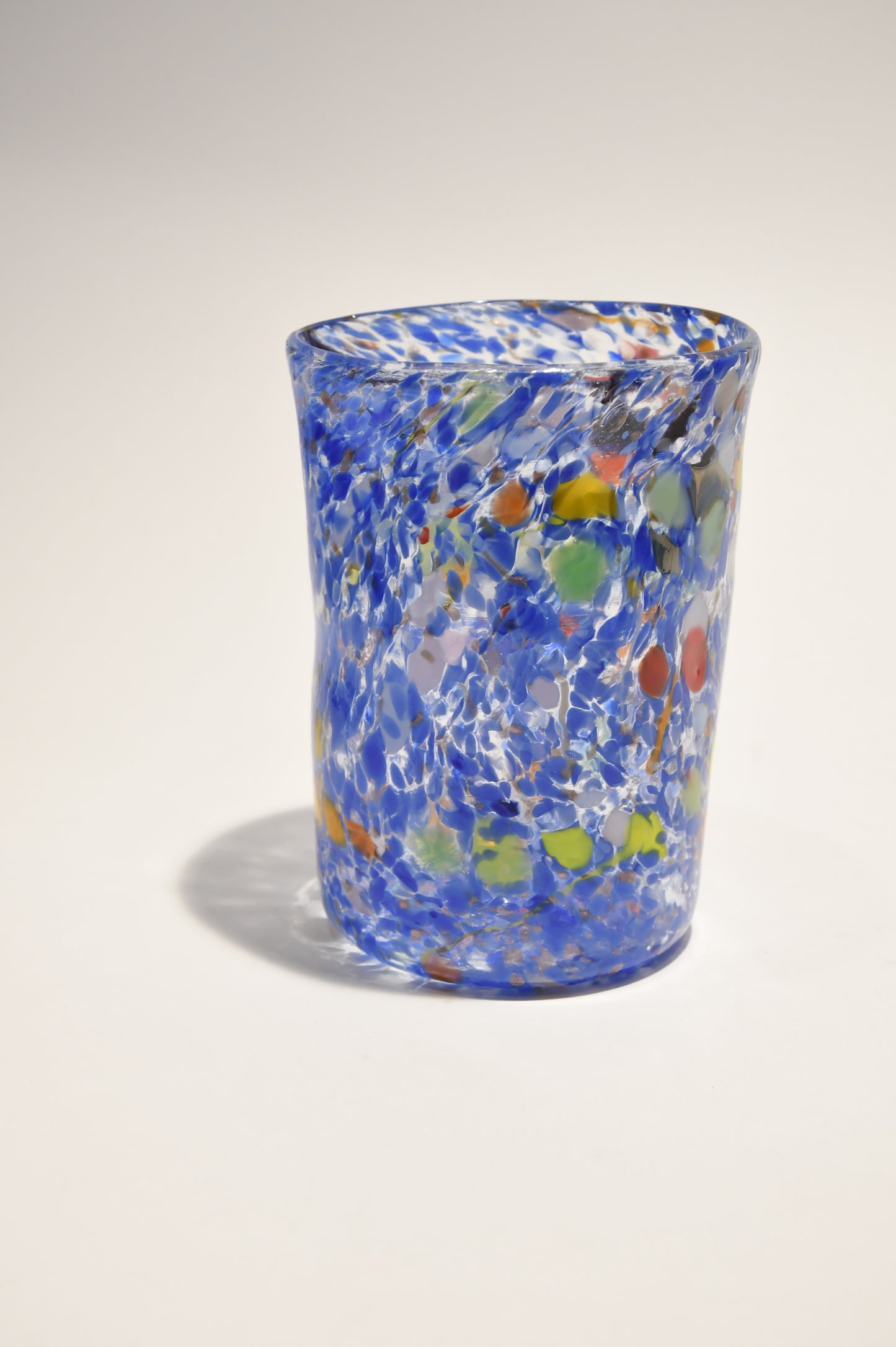 Murano glass tumbler with color spots and Aventurine