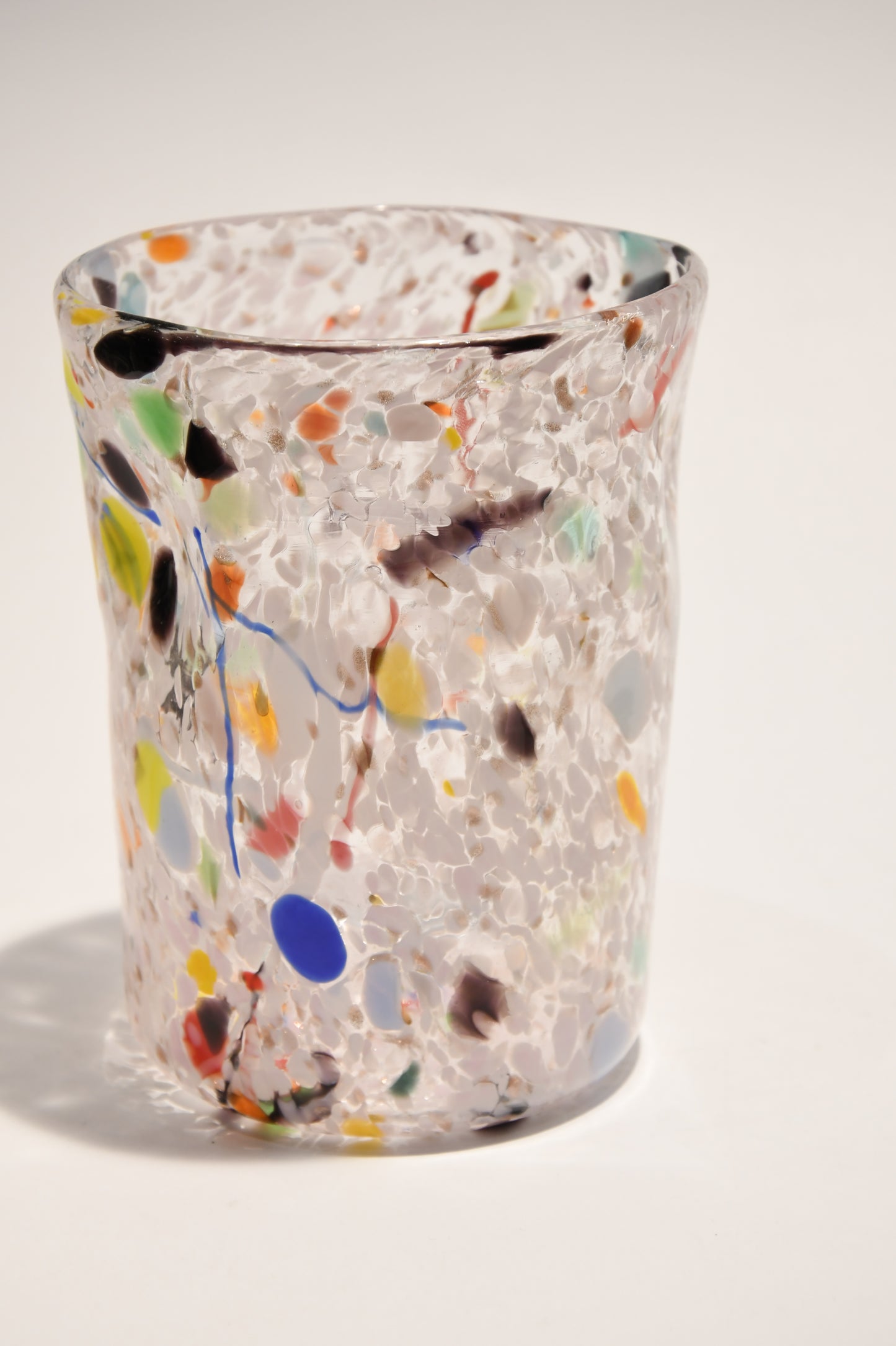 Murano glass tumbler with color spots and Aventurine