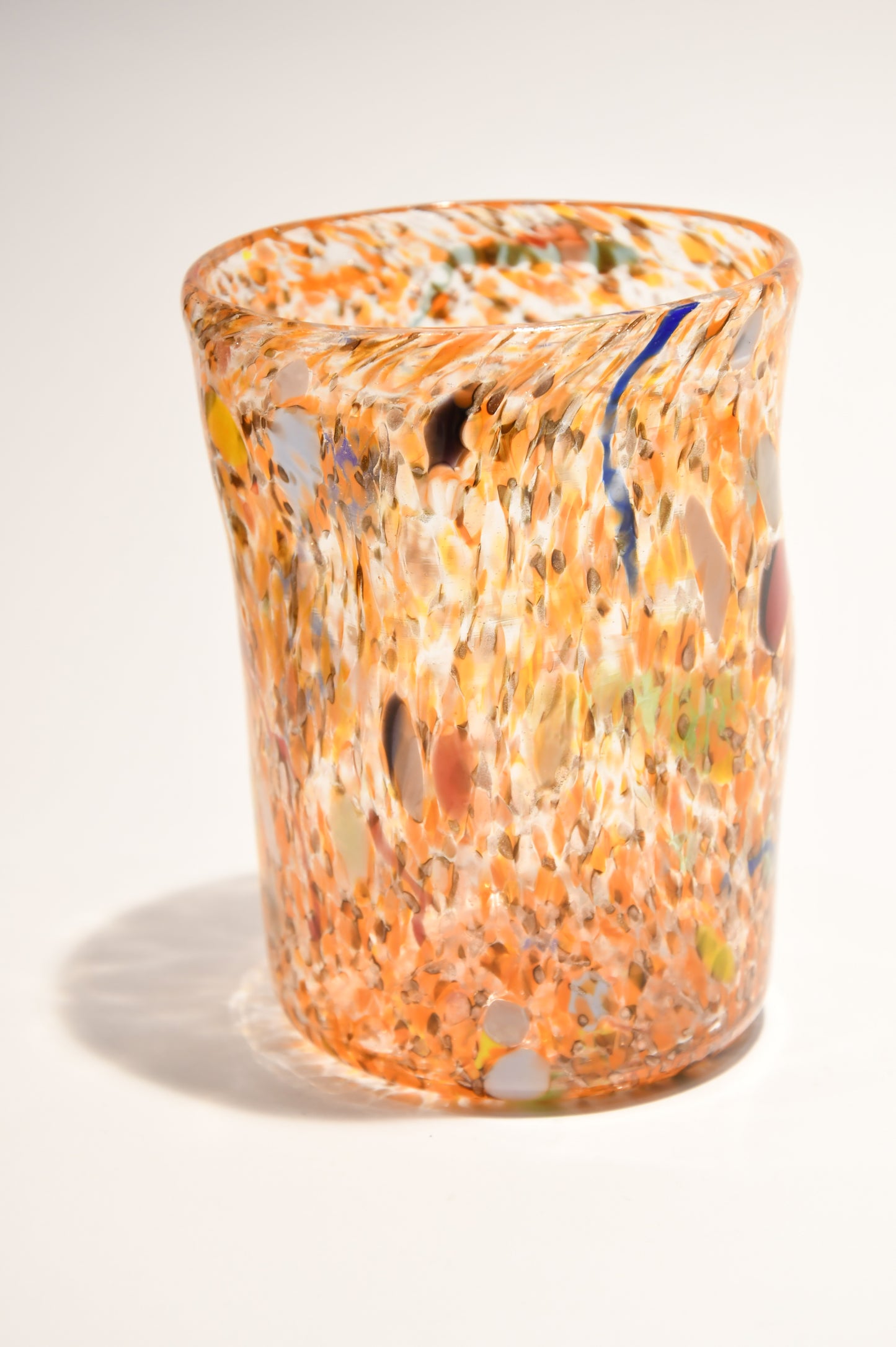 Murano glass tumbler with color spots and Aventurine