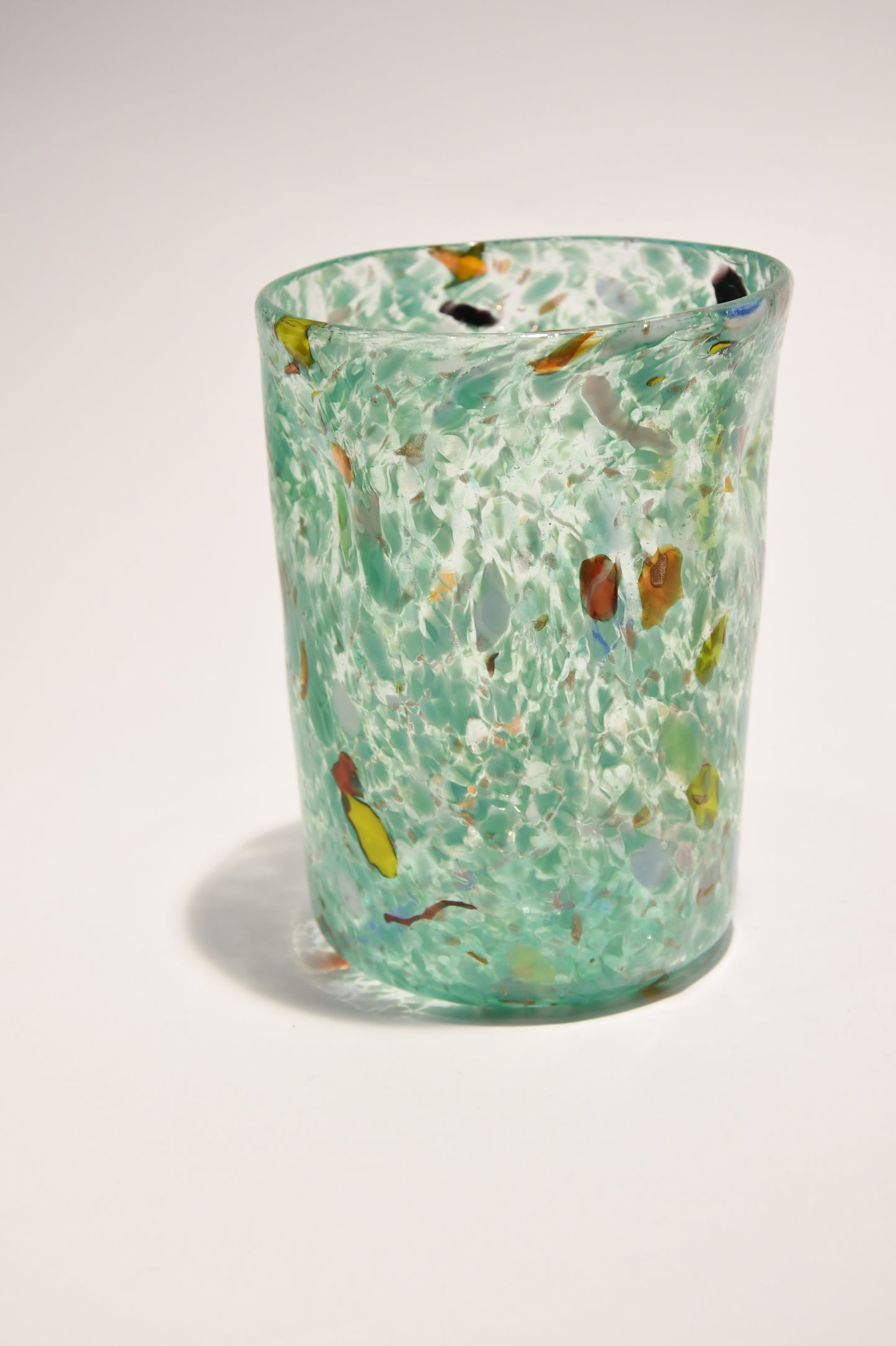 Murano glass tumbler with color spots and Aventurine