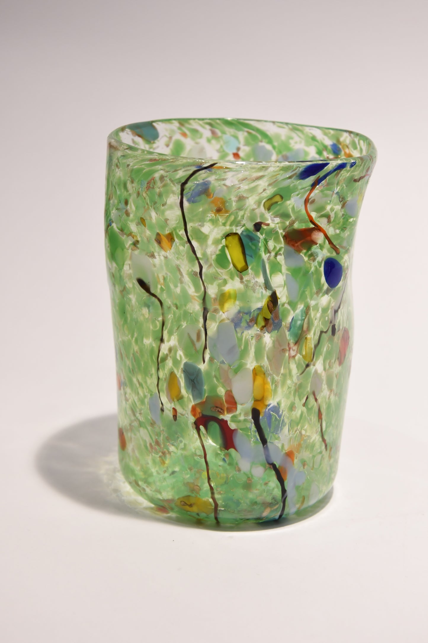 Murano glass tumbler with color spots and Aventurine