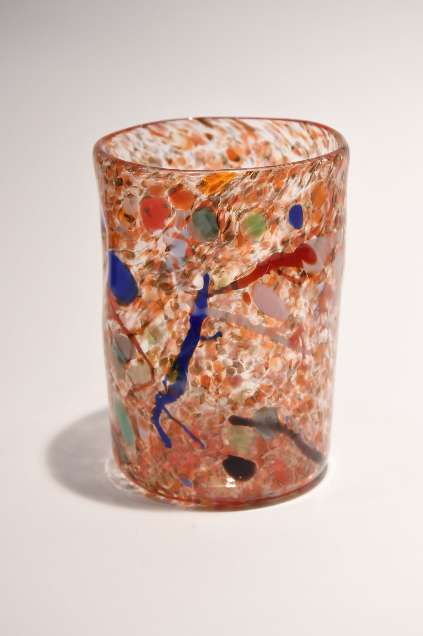 Murano glass tumbler with color spots and Aventurine