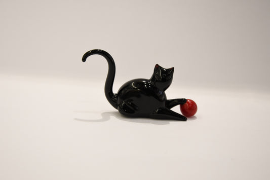 Black cat with Murano glass ball