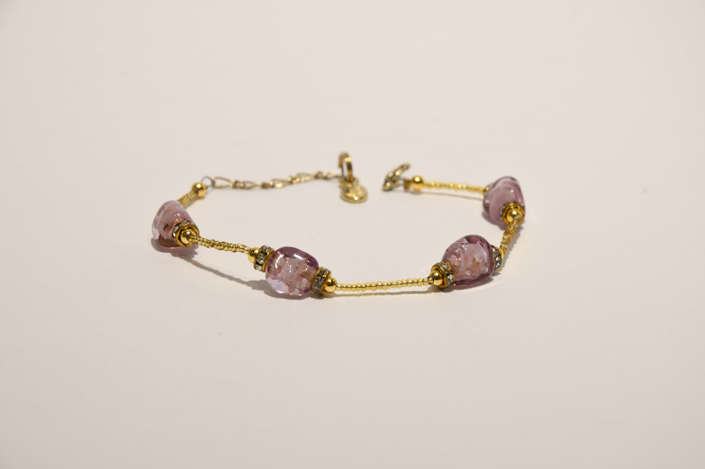 Golden bracelets with 4 pomegranate style beads in Murano glass