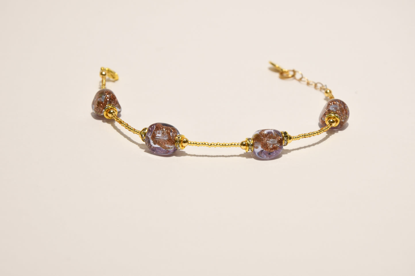 Golden bracelets with 4 pomegranate style beads in Murano glass