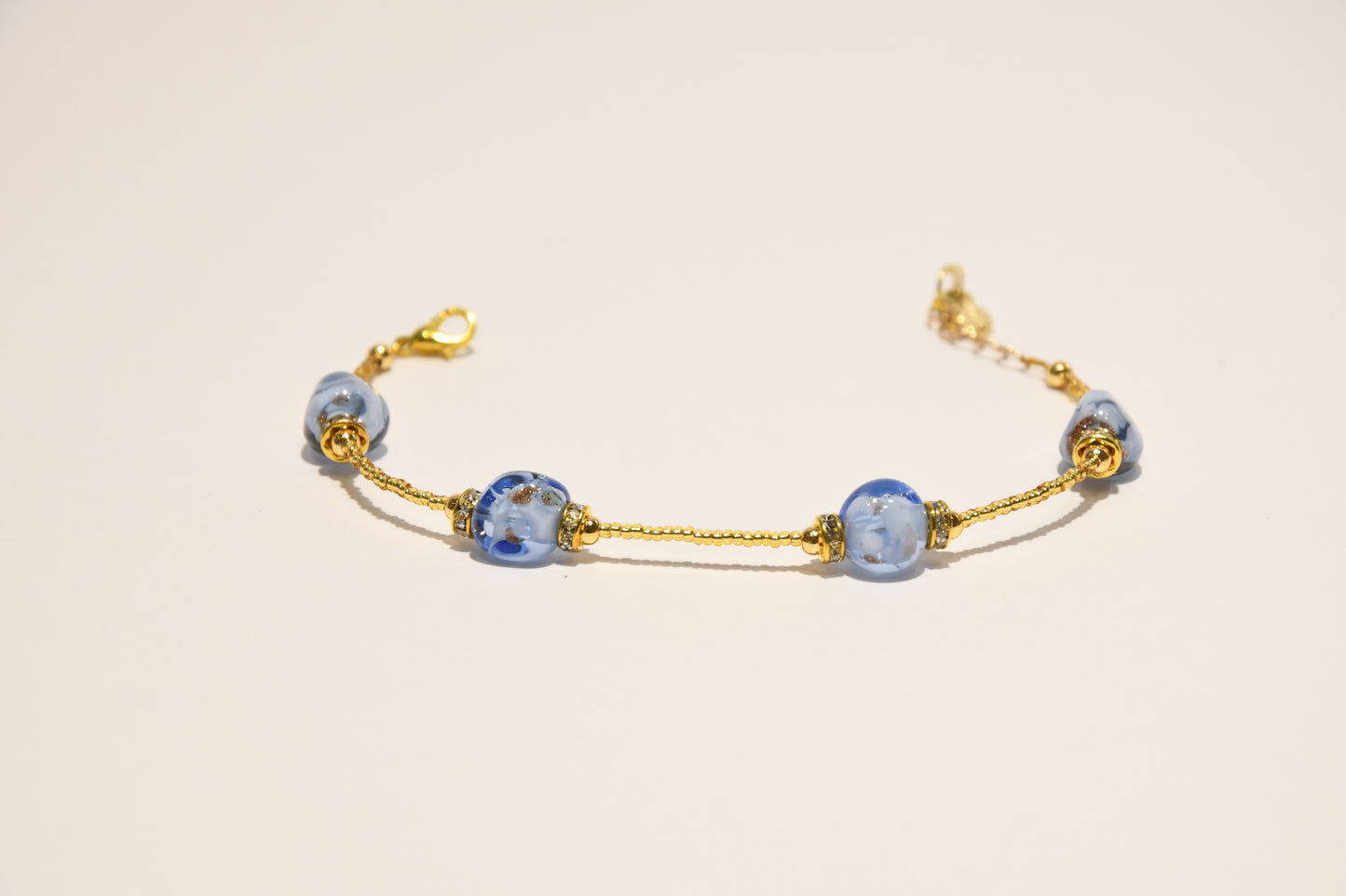 Golden bracelets with 4 pomegranate style beads in Murano glass