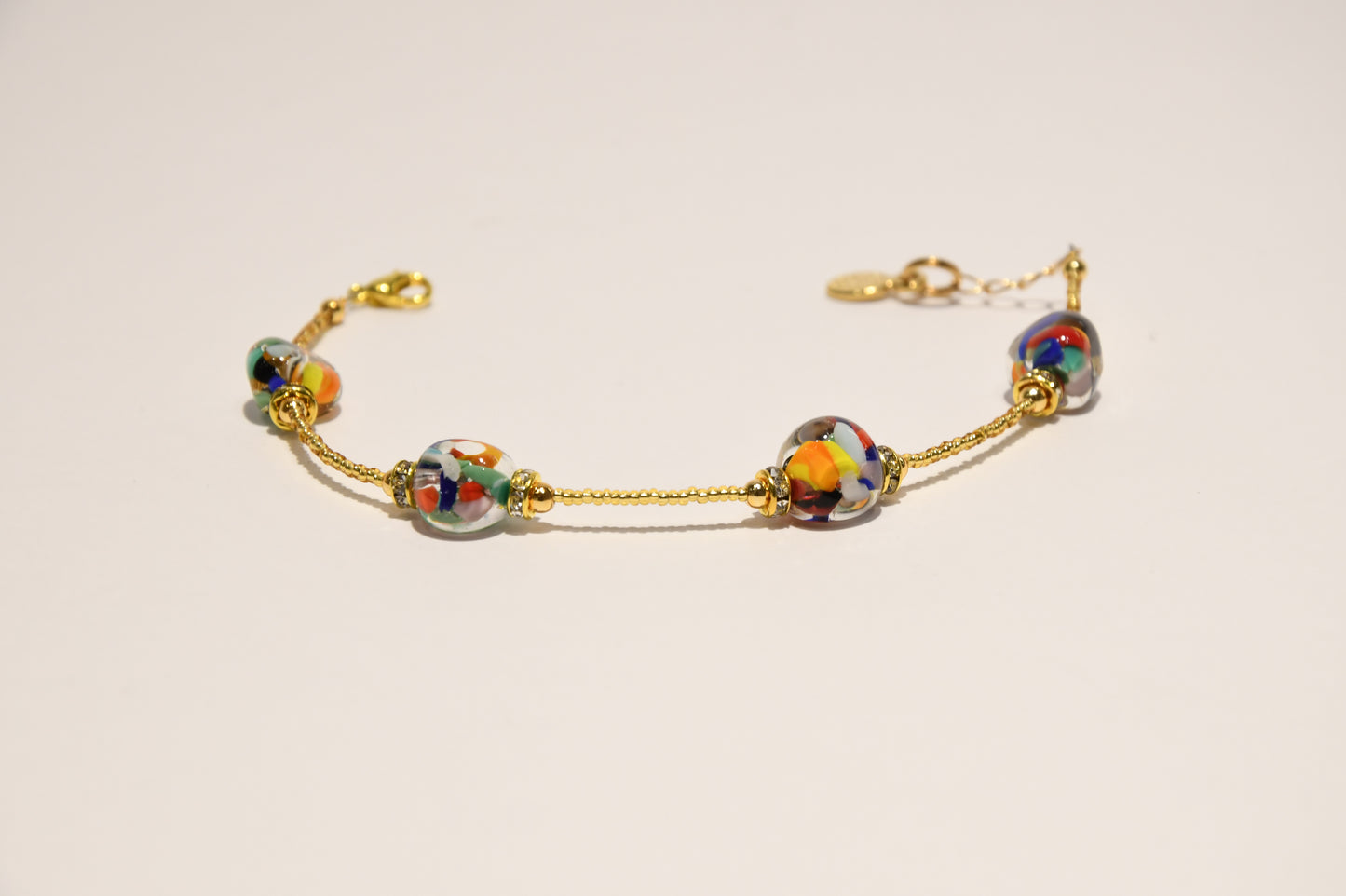 Golden bracelets with 4 pomegranate style beads in Murano glass