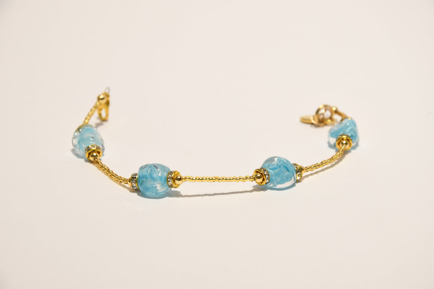 Golden bracelets with 4 pomegranate style beads in Murano glass