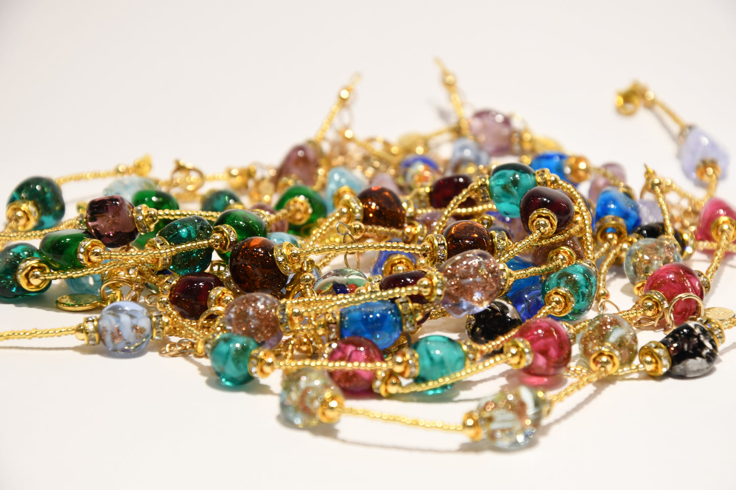 Golden bracelets with 4 pomegranate style beads in Murano glass